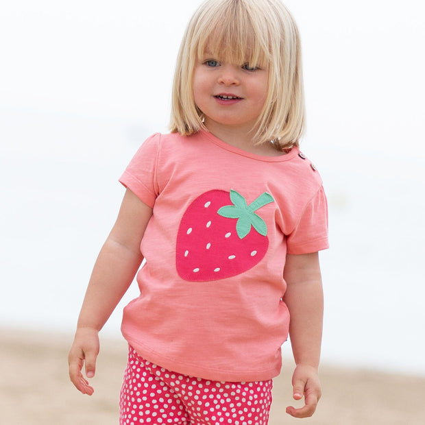 Girl in strawberry t-shirt