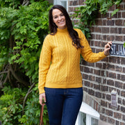 Woman in bryanston jumper mustard