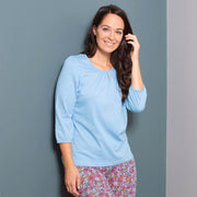 Woman in stour jersey top blue