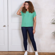 Woman in haven knit top green
