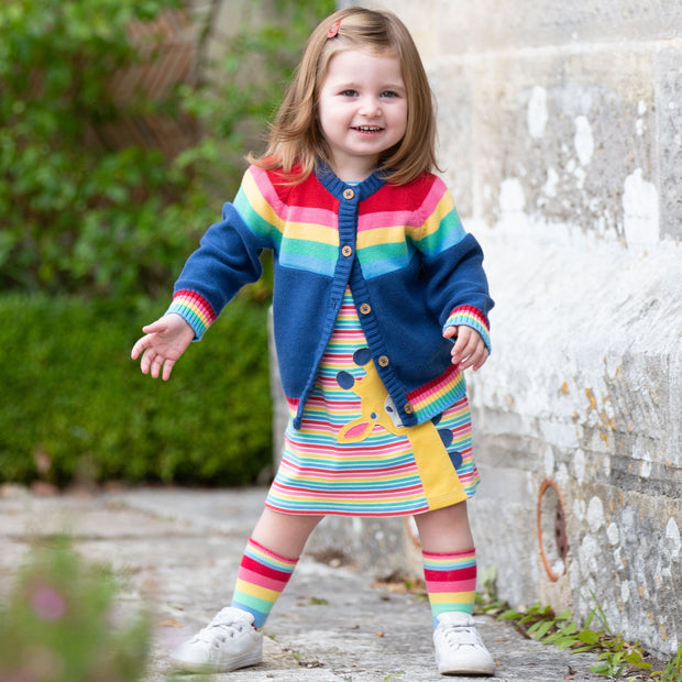 Girl in rainbow zebra socks