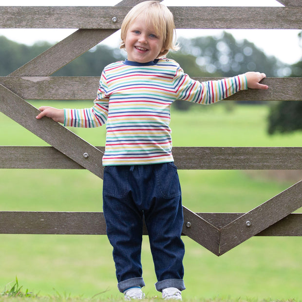 Boy in denim carrot pull ups