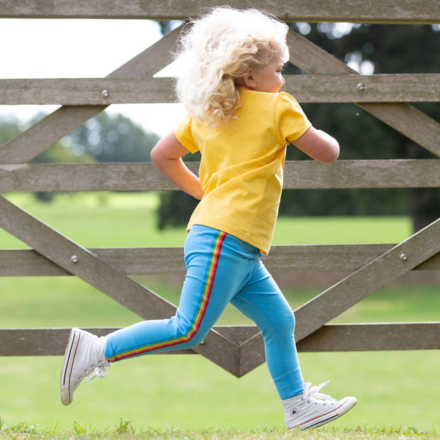 Girl in side stripe leggings