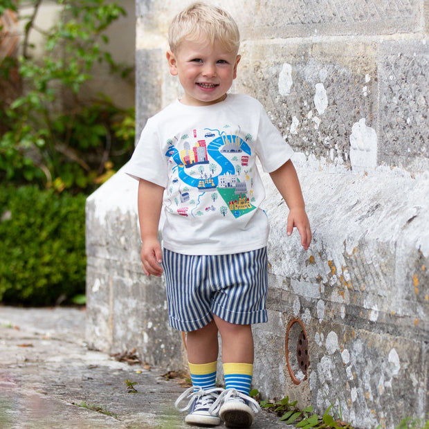 Boy in ticking turn-up shorts