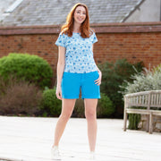Woman in kimmeridge shorts blue