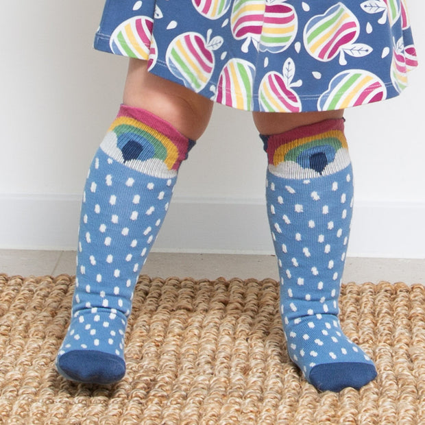 Girl in foxy rainbow socks
