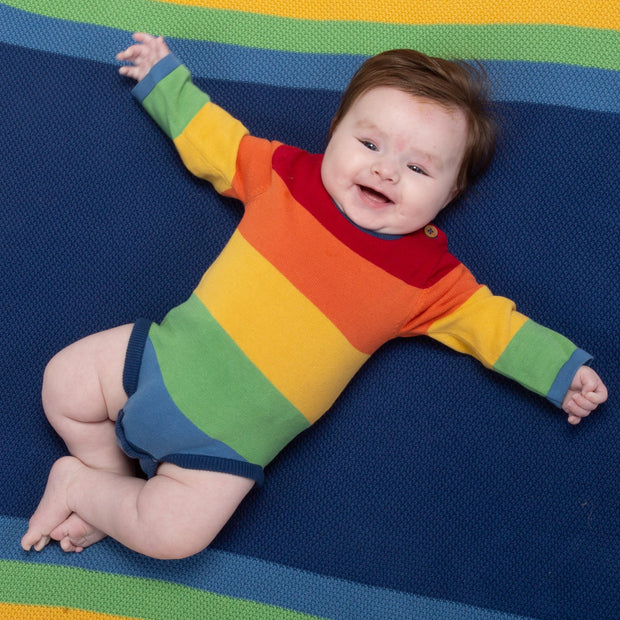 Baby in bright stripe knit body