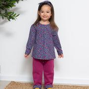 Girl in home ditsy tunic