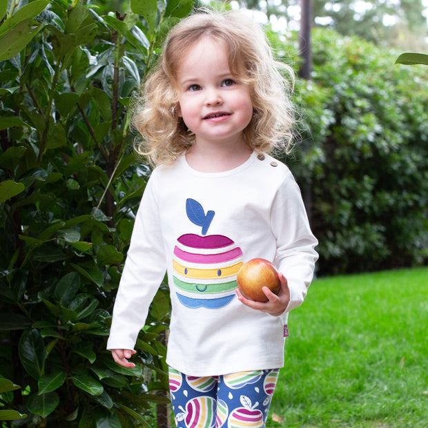 Girl in happy apple t-shirt
