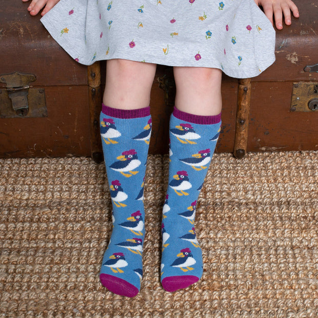 Girl in puffling cosy socks
