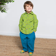 Boy in polka rainbow shirt