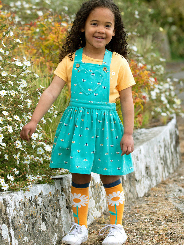 Kite - Girls organic mini queen bee pinafore green - Adjustable straps with coconut buttons