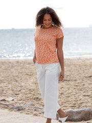 Kite - Womens organic Alum jersey top petal perfume sunset orange - All-over print - Relaxed fit