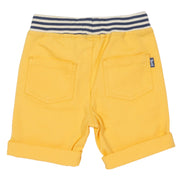 Boy in mini yacht shorts yellow