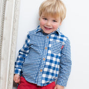 Boy in mix and match shirt
