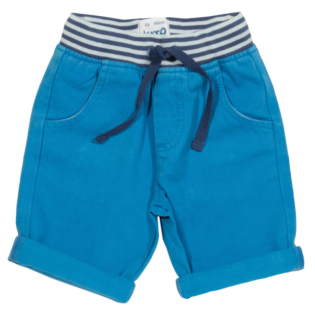 Boy in mini yacht shorts