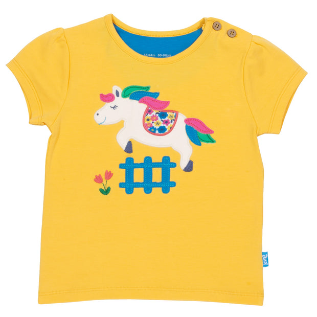 Girl in little pony t-shirt